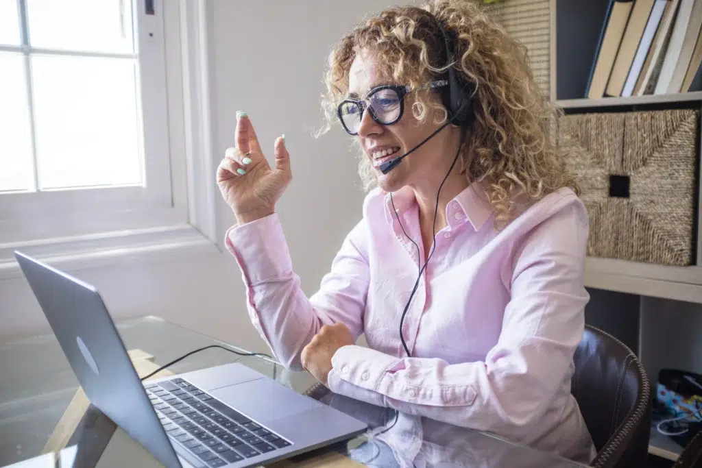Remote executive assistant on video call with business client